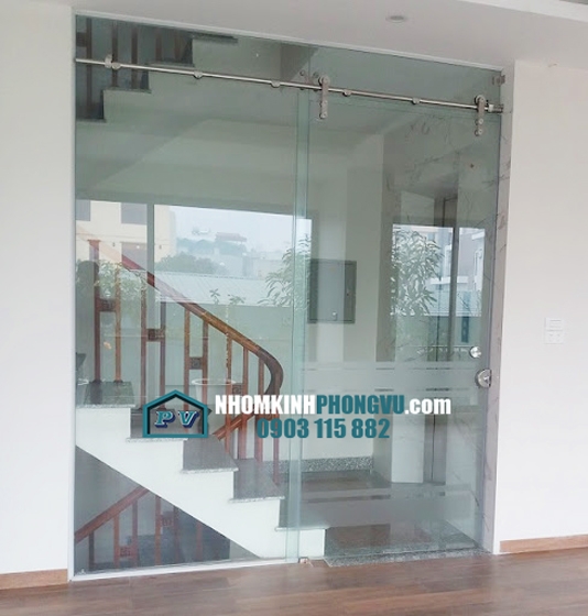 Thi công cửa kính cường lực lùa treo phi 25 tại đường Lê Văn Lương, Quận 7, TPHCM