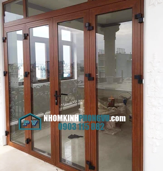 Thi công cửa nhôm kính Xingfa màu vân gỗ tại đường Phạm Văn Chiêu, Quận Gò Vấp, TPHCM